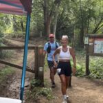 Emma Dawson and Ivan Chunnett running in the 2025 Farnham Pilgrim marathon