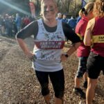 A very muddy Carolyn Wickham after the 2025-26 SXCL Alice Holt cross country