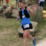 Linda Tyler running in the 2025 Scilly Isles 60k