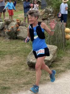 Linda Tyler running in the 2025 Scilly Isles 60k