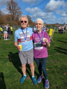Robert and Jean Drummond with their finishers medals after the Rushmoor Wellseley 10km race