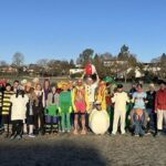 Group of the participants in fancy dress before the start of the 2025 Club Handicap race