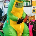 Chris Gill dressed as a dinosaur at the 2025 Club Handicap race