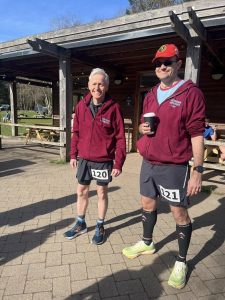 Farnham Runners Chris Raby (left) and Ivan Chunnett posing after completing the 2026 Lone Wolf 'backyard ultra' in Alice Holt Forest