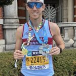 Chris Matthews with his Tokyo Marathon and Six Star medals