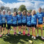 Farnham Runners group after the 2026 HRRL Salisbury 10 race, most wearing the Salisbury 10 T-shirts
